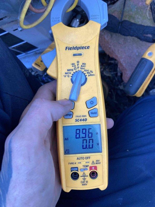 Completed preventive maintenance tune-up on heating system. Performed system diagnostics using clamp meter to verify electrical readings and amperage draw. Inspected and cleaned flame sensor rod, which showed carbon buildup and discoloration from normal operation, to ensure proper flame detection and system safety during heating cycles.