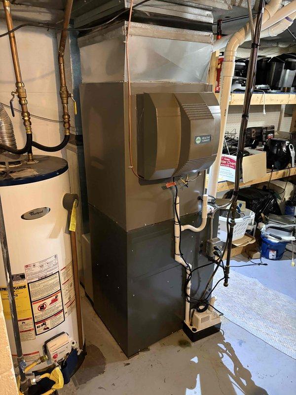 Completed installation of new air conditioning system and evaporator coil on existing furnace system. Performed nitrogen pressure test at 1342 psig to verify system integrity and ensure no leaks in refrigerant lines. System tested and operational upon completion of installation.