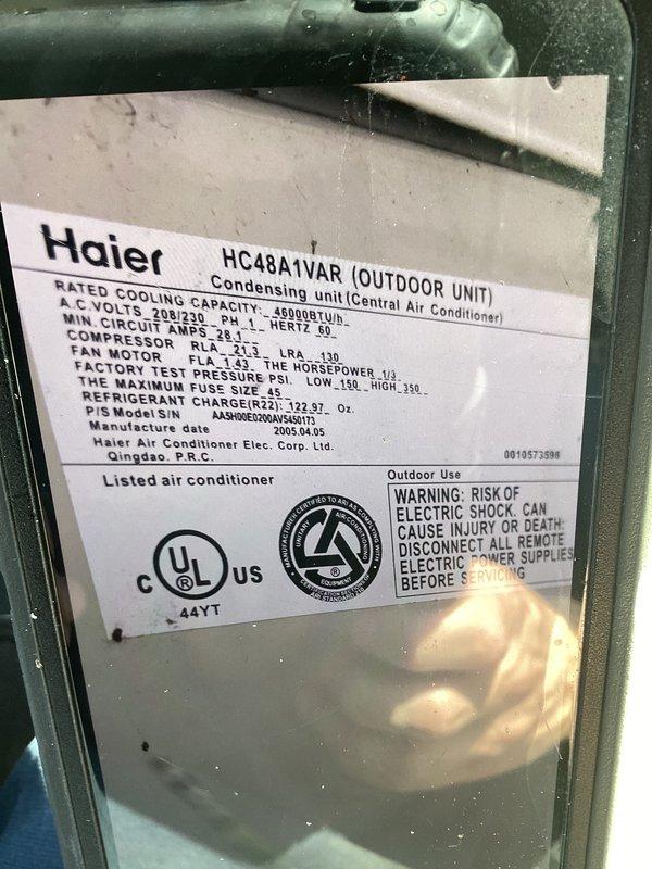 Responded to no cooling complaint on 30-year-old residential air conditioning system. Upon arrival, confirmed outdoor unit fan motor was operating but system was not producing adequate cooling. Performed diagnostic evaluation of both indoor and outdoor components. Inspected 2005 Haier HC48JVAR outdoor condensing unit (48,000 BTU/h, R22 refrigerant) and Goodman furnace GMH950904CXAC. Given the advanced age of the equipment (30 years old, original to home) and the cost-effectiveness of repairs versus replacement, provided customer with options and recommendations. Documented equipment model and serial numbers with photographs for customer records. Customer opted to proceed with consultation only at this time.