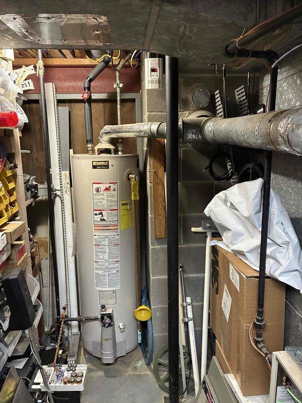 Completed comprehensive estimate for full central air conditioning system replacement on 17-year-old 410A unit with large refrigerant leak rendering repair uneconomical. Assessed existing outdoor condenser and indoor air handler configuration in basement mechanical room, noting system age and refrigerant phase-out considerations. Documented current equipment specifications, ductwork connections, and electrical requirements. Provided detailed replacement options and recommendations for new high-efficiency cooling system compatible with existing furnace and duct infrastructure.