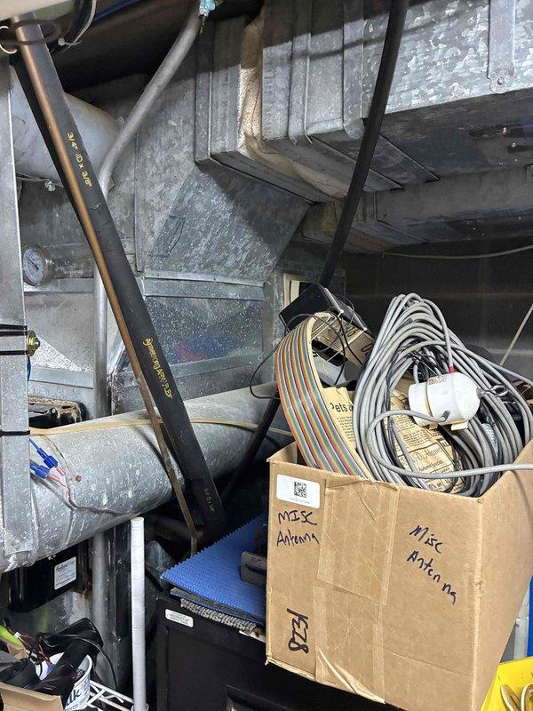 Completed comprehensive estimate for full central air conditioning system replacement on 17-year-old 410A unit with large refrigerant leak rendering repair uneconomical. Assessed existing outdoor condenser and indoor air handler configuration in basement mechanical room, noting system age and refrigerant phase-out considerations. Documented current equipment specifications, ductwork connections, and electrical requirements. Provided detailed replacement options and recommendations for new high-efficiency cooling system compatible with existing furnace and duct infrastructure.