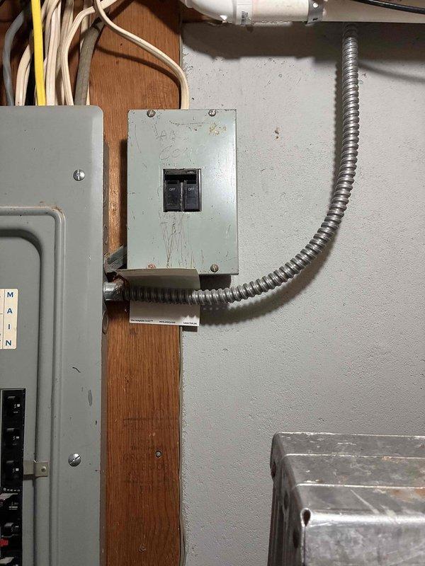 Provided estimate for installation of hanging unit heater in residential garage space. Assessed existing electrical infrastructure including main panel and available circuit capacity, evaluated garage dimensions and layout to determine optimal heater placement and BTU requirements, and identified necessary electrical modifications including dedicated circuit breaker installation and conduit routing from main service panel to proposed heater location.