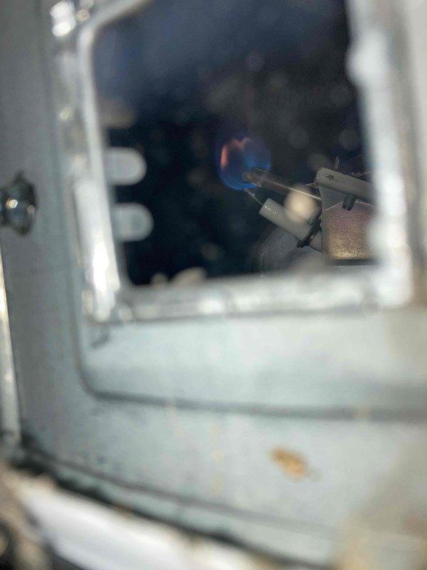 Responded to no-light condition on tanked water heater with standing pilot system. Upon inspection, confirmed pilot would not remain lit, indicating failed thermocouple as suspected. Accessed burner compartment, tested thermocouple output, and verified insufficient millivolt generation to hold gas valve open. Replaced defective thermocouple with new unit, repositioned pilot assembly for proper flame impingement on thermocouple tip, and successfully relit pilot. Verified main burner ignition, proper flame characteristics with blue base and yellow tips, and confirmed unit cycling correctly through thermostat demand. System restored to full operation.