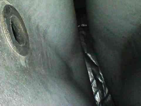 Responded to no cooling complaint on 10+ year old AC unit with frozen refrigerant lines. Upon arrival, lines had thawed; performed system diagnostic to identify root cause of freezing condition, which typically indicates restricted airflow, low refrigerant charge, or metering device malfunction. Inspected evaporator coil access area and system components to determine necessary repairs for restoring proper cooling operation.