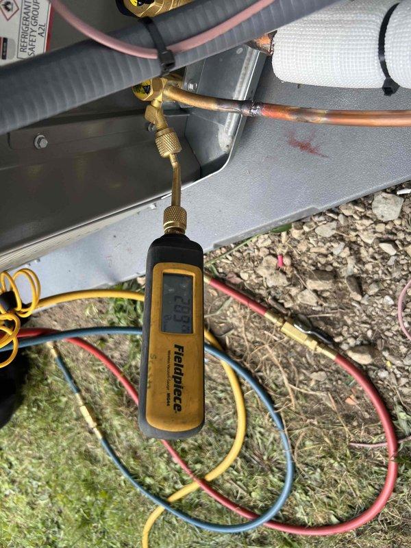 Responded to warranty call for recently installed air conditioning system experiencing operational issues. Upon diagnostic evaluation using digital manifold gauges and pressure testing equipment, determined the outdoor condensing unit required complete replacement. Successfully removed defective unit and installed new condensing unit, reconnected refrigerant lines with proper insulation, verified all service port connections, and confirmed system is operating within manufacturer specifications.