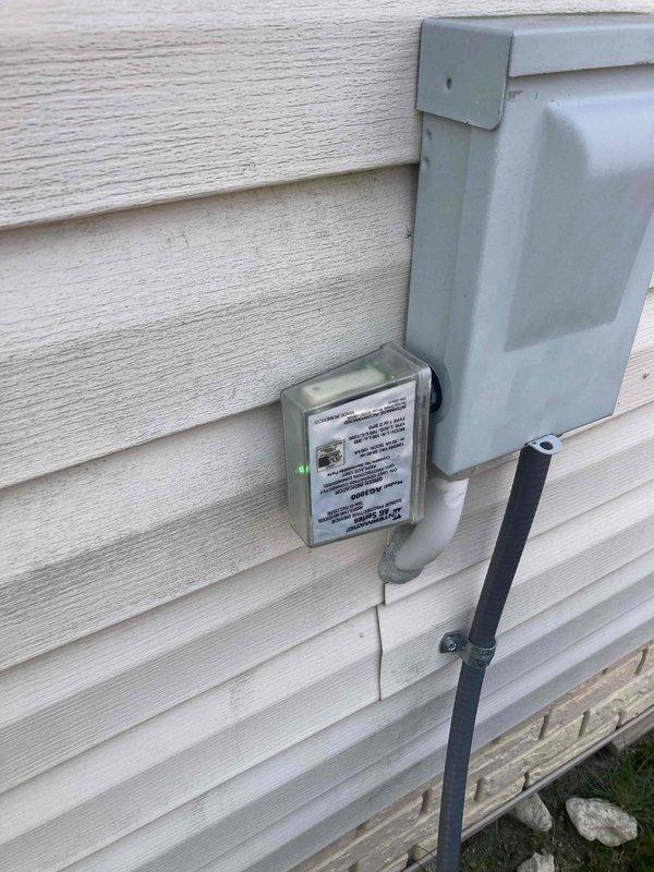Completed scheduled preventative maintenance and tune-up on residential air conditioning system. Performed comprehensive system inspection including electrical testing of capacitor using digital multimeter, verified proper voltage readings, and inspected contactor and relay components. Inspected condenser coil condition and outdoor disconnect box with visible LED indicator confirming proper operation. System operating within normal parameters with no issues identified during routine maintenance visit.