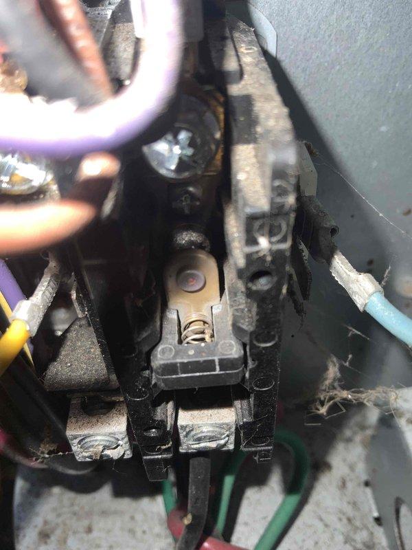 Responded to no-cool call on 5-year-old air conditioning system previously installed by our company. Upon arrival, confirmed unit would not start and provided no cooling to the residence. Performed diagnostic inspection of outdoor condensing unit and indoor air handler components. Inspected electrical connections at outdoor unit contactor assembly, noting multiple wire terminations and connection integrity. Examined indoor control board, blower motor assembly, and associated wiring harnesses for proper operation and secure connections. Documented system conditions with photographs showing electrical terminal block connections and internal air handler components including control board with multi-colored wire connections, blower motor, and condensate management system. Completed check-with-owner-watching (CWOW) protocol, reviewing findings and system status with homeowner present throughout diagnostic process.