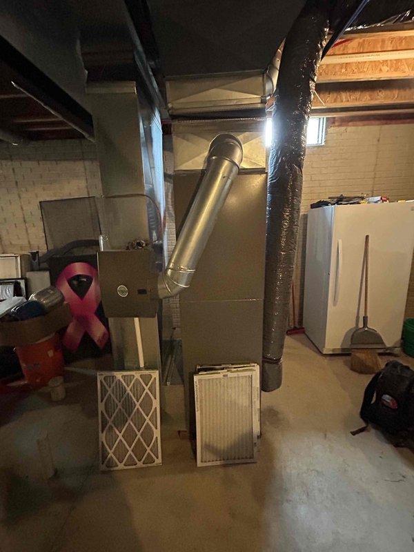 Completed installation of 3.5 ton air conditioning system with matching evaporator coil in rear yard location. Performed all mechanical and electrical connections to integrate new outdoor condensing unit with existing furnace system in basement, reconnected refrigerant lines, and verified proper system operation upon startup.