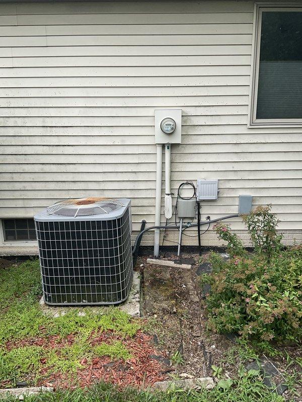 Performed estimate for replacement of 20-year-old residential air conditioning system that is not blowing cold air. Evaluated existing outdoor condensing unit showing signs of age and corrosion, along with indoor evaporator coil manufactured by CAC/BRP. Provided replacement options for complete AC system to restore cooling functionality to the home.