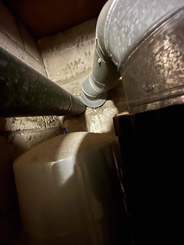 Responded to no-heat call on 32-year-old Weil McLain boiler system with communication failure between thermostat and boiler. Upon arrival, confirmed pilot light was operational but system was not initiating heating cycle. Diagnosed and resolved thermostat-to-boiler communication issue. Inspected thermocouple and pilot assembly, noting shorter-than-standard length which was contributing to intermittent signal transmission. Replaced thermocouple assembly with properly-sized component to ensure reliable flame sensing and system operation. Tested all safety controls, verified proper pilot flame characteristics, and confirmed successful communication between thermostat and boiler controls. Cycled system through multiple heating cycles to verify reliable ignition sequence and proper operation. System restored to full heating functionality with all components operating within manufacturer specifications.