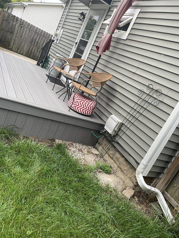 Conducted site evaluation for mini split installation at residential property. Assessed exterior mounting locations including elevated deck area and side yard access, documented electrical routing paths and clearance requirements, and photographed installation zones to develop comprehensive equipment placement proposal for 10-12 SEER rated ductless system.