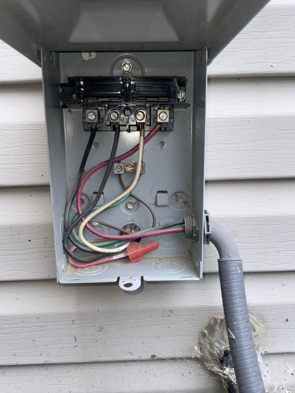 Responded to no-cooling call for 22-year-old Carrier central air conditioning system. Upon arrival, performed diagnostic evaluation of outdoor disconnect box and indoor equipment. Inspected electrical connections at exterior disconnect, verifying wire terminations and circuit breaker functionality. Examined indoor HVAC cabinet and associated components in mechanical room. Given the age of the system and no-cooling condition, advised customer that major component failure was likely and discussed options for repair versus replacement, with replacement being the more cost-effective solution for a system of this age beyond its expected service life.