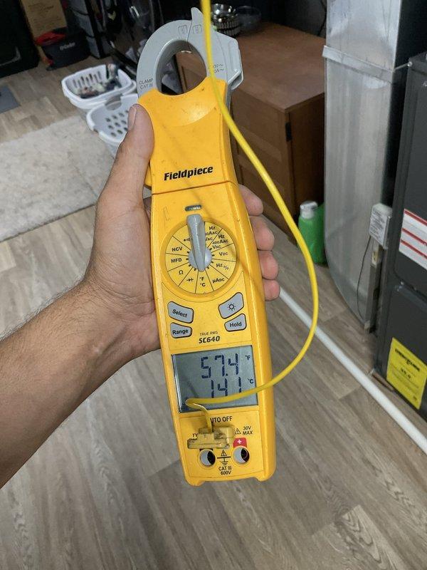 Completed seasonal air conditioning maintenance agreement visit. Inspected exterior refrigerant lines and electrical connections at outdoor unit, verified system amperage readings using clamp meter showing normal operating parameters within manufacturer specifications. All components functioning properly with no issues identified during inspection.