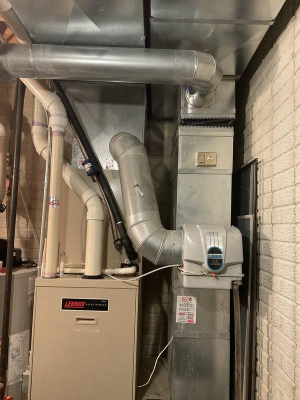 Conducted comprehensive assessment of 25+ year old Lennox HVAC system experiencing multiple component failures. Identified seized outdoor fan motor and multiple capacitors testing out of acceptable range during diagnostic evaluation. Documented existing equipment configuration including furnace, ductwork distribution system, electrical service panel, and auxiliary air quality components. Provided detailed system replacement estimate as alternative to component-level repairs given age and condition of equipment, allowing property owner to evaluate repair versus replacement options.