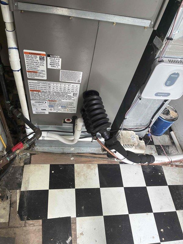 Completed installation of 2.5 ton air conditioning system with matching evaporator coil in right side yard location. Installed new indoor air handler unit with proper refrigerant line connections, PVC condensate drainage, and electrical reconnection to existing system. All mechanical and electrical components tested and verified operational upon completion.