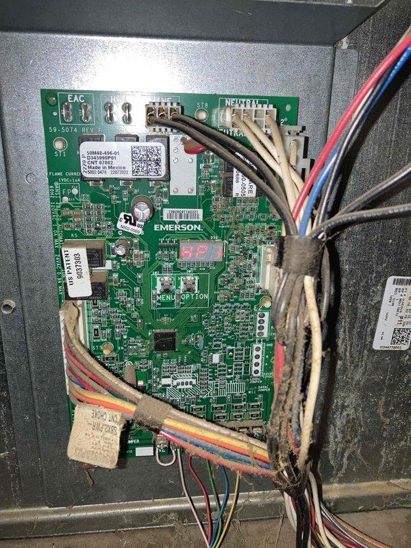 Completed prepaid AC tune-up maintenance on residential air conditioning system with no reported issues. Performed comprehensive system inspection including control board evaluation and electrical diagnostics, measuring 499 reading on clamp meter at outdoor condenser unit. Inspected circuit board connections, wiring harnesses, and all electronic components for proper operation and wear.