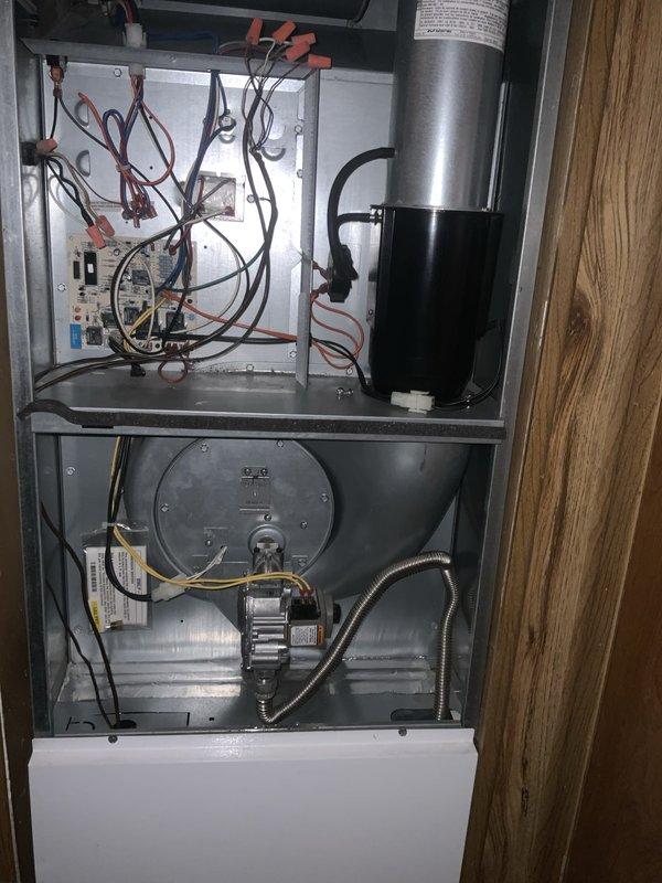 Responded to no-cooling call following power outage. Inspected electrical components and control board within air handler cabinet, verified all connections and circuit breakers. Replaced failed 10 MF capacitor on blower motor assembly. System tested and operational upon departure with normal airflow restored.