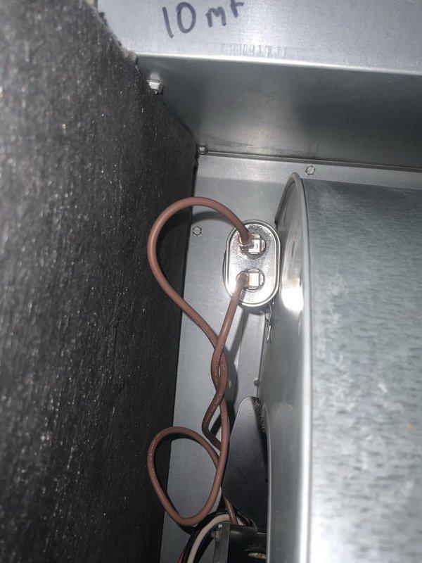 Responded to no-cooling call following power outage. Inspected electrical components and control board within air handler cabinet, verified all connections and circuit breakers. Replaced failed 10 MF capacitor on blower motor assembly. System tested and operational upon departure with normal airflow restored.