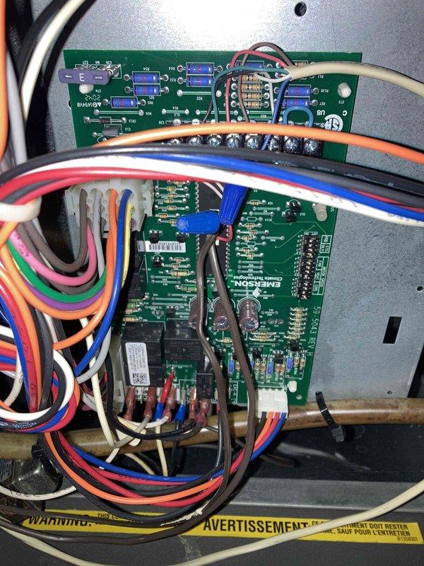 Completed prepaid air conditioner tune-up maintenance during morning appointment window. Performed comprehensive system inspection of outdoor AC unit, including electrical measurements using digital multimeter to verify proper voltage and amperage readings at 45.28 units. Inspected Emerson control board assembly, relay components, and multi-pin wire connections within control panel to ensure proper operation and secure terminations. No issues identified; system operating within normal parameters.