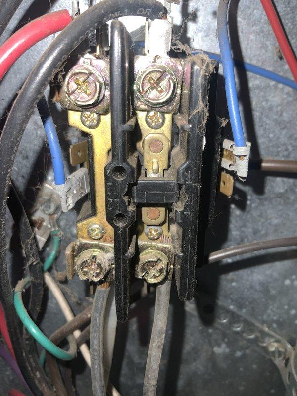 Responded to no cooling complaint on 19-year-old residential air conditioning system. Upon arrival, confirmed unit was running but delivering only room temperature air with no refrigeration cycle. Performed diagnostic evaluation of outdoor condensing unit and found failed contactor preventing compressor from energizing. Inspected electrical connections at contactor assembly, noting significant age-related corrosion and oxidation on brass terminals and contact points. Checked air filter condition and found moderate dust accumulation restricting airflow. Due to advanced age of system and extent of component wear, recommended full system replacement as most cost-effective solution. Explained that investing in repairs on 19-year-old equipment exceeds its remaining service life expectancy, as typical AC systems are designed for 12-15 years of operation. Provided system replacement options and pricing for new high-efficiency equipment.