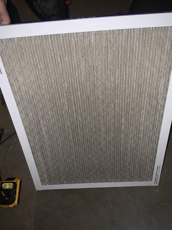 Responded to no cooling complaint on 19-year-old residential air conditioning system. Upon arrival, confirmed unit was running but delivering only room temperature air with no refrigeration cycle. Performed diagnostic evaluation of outdoor condensing unit and found failed contactor preventing compressor from energizing. Inspected electrical connections at contactor assembly, noting significant age-related corrosion and oxidation on brass terminals and contact points. Checked air filter condition and found moderate dust accumulation restricting airflow. Due to advanced age of system and extent of component wear, recommended full system replacement as most cost-effective solution. Explained that investing in repairs on 19-year-old equipment exceeds its remaining service life expectancy, as typical AC systems are designed for 12-15 years of operation. Provided system replacement options and pricing for new high-efficiency equipment.