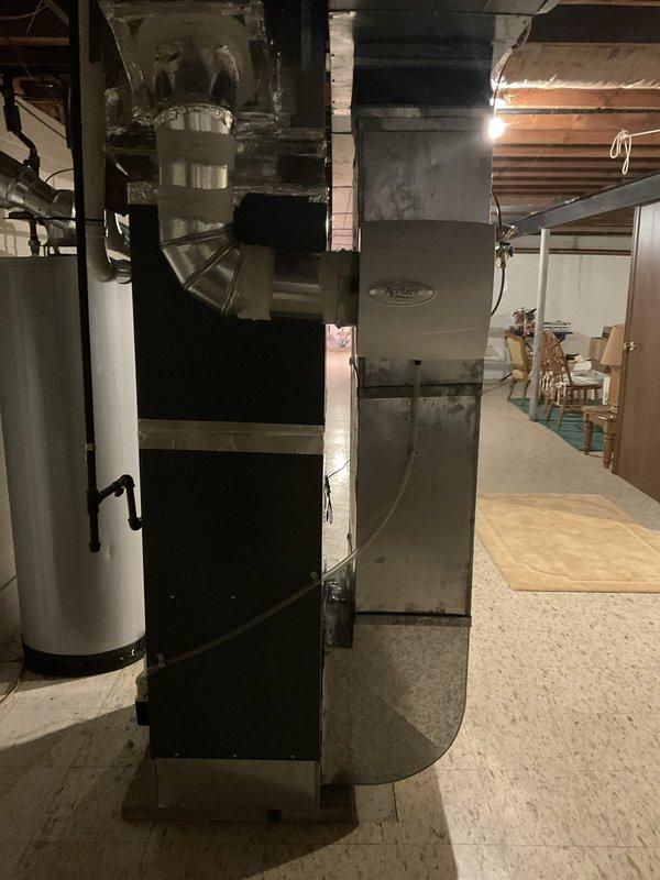 Conducted in-home estimate for furnace replacement in basement location. Existing 7-year-old furnace reported as undersized and unable to maintain comfort during extreme cold weather when outdoor temperatures approach zero degrees. Assessed current heating system and documented equipment specifications through photographic documentation. Evaluated installation area including ductwork configuration, venting arrangements, and existing infrastructure. Recommended replacement with properly-sized single-stage 70,000 BTU furnace unit while retaining existing air conditioning system. Load calculation required and will be documented to confirm appropriate equipment sizing for heating demands and building characteristics.