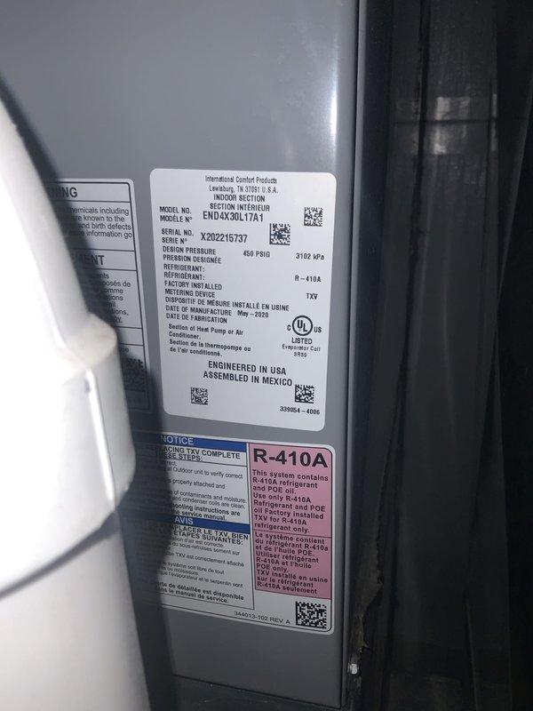 # HVAC Service Completed

Responded to service call for air conditioning system not cooling adequately. Unit confirmed operational but delivering insufficient cooling performance. Performed diagnostic evaluation on International Comfort Products model END4X3NL17A1 air conditioning system, manufactured May 2020, utilizing R-410A refrigerant. 

Conducted thorough inspection of exterior condensing unit and interior air handler components. Accessed control board and electrical connections within furnace cabinet to verify proper system operation and identify potential issues affecting cooling capacity. Documented equipment nameplate data and current system configuration for service records.