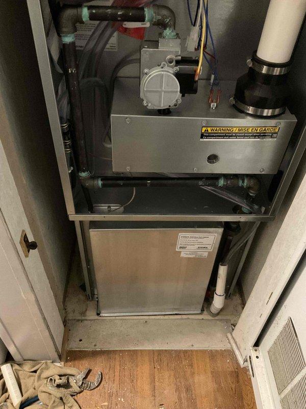 Completed full HVAC system installation for manufactured home including 60,000 BTU gas furnace and 2.5 ton air conditioning unit positioned in rear yard location. Installed all mechanical components, electrical connections, refrigerant lines, condensate drainage via PVC piping, and ductwork connections. Verified proper system operation, airflow, and reconnected all utilities to ensure complete functionality of heating and cooling system.
