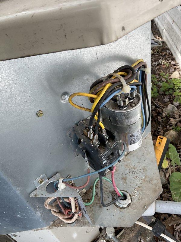 Completed preventive maintenance tune-up on residential air conditioning and furnace system located in garage. Inspected outdoor condensing unit components including dual capacitor, contactor, and associated wiring connections; verified proper operation and cleaned accumulated debris from unit exterior. Evaluated indoor air handler assembly including blower compartment and filter access; confirmed adequate airflow through return air grille and ductwork connections.