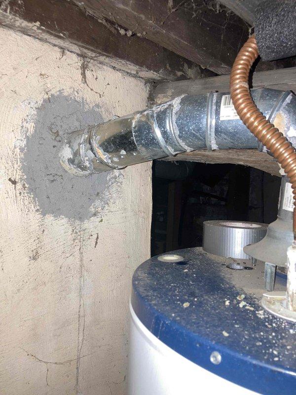 Performed warranty follow-up inspection on water heater installation, reviewing system components including pressure relief valve assembly with temperature indicator and main supply connections. Discussed water heater operation and maintenance requirements with customer, verified proper installation of venting system and reviewed all safety features. Completed required warranty documentation and obtained customer signature on paperwork to finalize warranty registration.