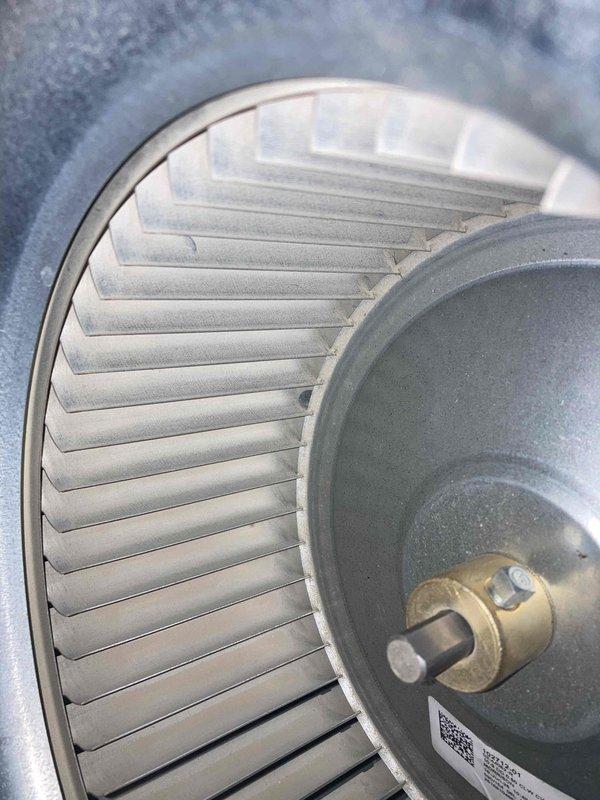 Completed preventative maintenance agreement visit on residential air conditioning system under Club AC8-12 plan. Performed comprehensive system inspection including amperage draw testing, which measured 40.3 amps at the condenser unit, indicating normal operating conditions within manufacturer specifications. Inspected blower wheel assembly and found minimal dust accumulation with components in good operational condition.