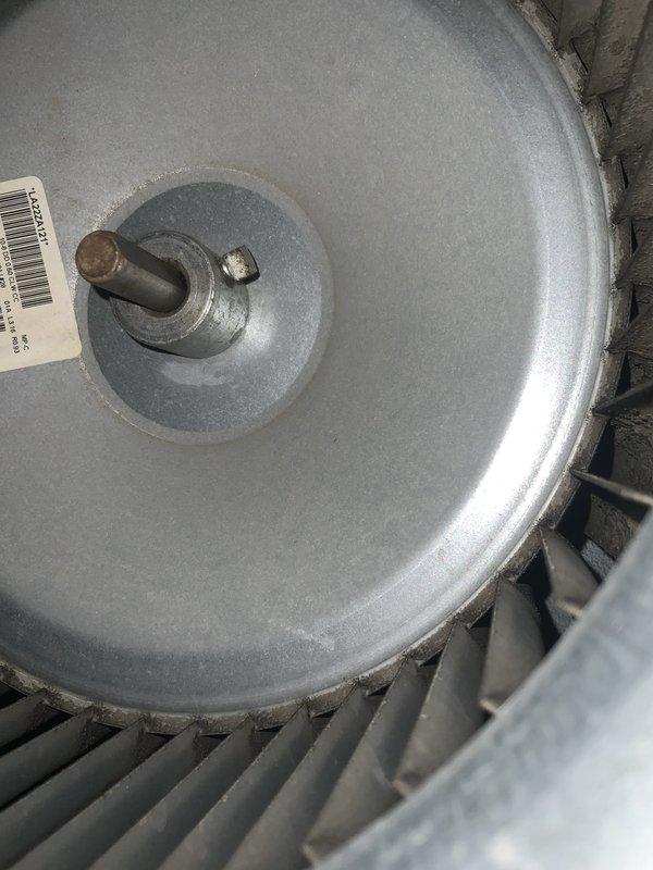 Responded to no cooling complaint on aging HVAC system. Upon inspection, documented equipment nameplate specifications and condenser fan motor assembly condition. Unit showed signs of age-related wear consistent with 10+ year operation, requiring further diagnostic evaluation to determine root cause of cooling failure.