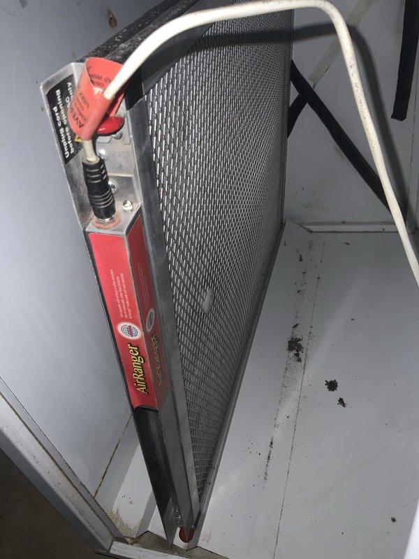 Responded to report of active water leak at furnace location with heating and cooling system still operational. Upon inspection, confirmed condensate pump failure preventing proper drainage from two-year-old furnace unit in basement. Examined evaporator coil assembly and condensate overflow safety switch, which appeared to be functioning correctly. Verified refrigerant lines and A-frame coil configuration showed no visible damage or leaks. Inspected electrical control components and circuit board for any related issues that could affect condensate removal system. Documented system conditions with photos showing evaporator coil assembly with safety switch and control panel components in operational condition. Pump replacement required to restore proper condensate drainage and prevent water accumulation in furnace area.