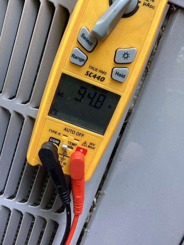 Completed routine preventative maintenance agreement visit on a 9-year-old Carrier HVAC system, model 59TPA080E171216, manufactured July 2017. Performed comprehensive AC tune-up including system inspection, electrical testing with multimeter (recorded 7.48 reading), verification of unit specifications against manufacturer data plate, and visual assessment of heat exchanger components. All equipment operating within normal parameters with no deficiencies noted; system cleared for continued operation.