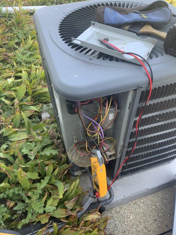 Responded to service call for air conditioning unit displaying error code. Upon arrival, accessed electrical compartment of outdoor condensing unit and performed diagnostic testing using multimeter to troubleshoot the malfunction. Tested voltage and continuity across multiple wire connections and terminal blocks to identify the source of the error code. Inspected all electrical connections, wiring harness, and control components for proper operation and secure terminations. Successfully diagnosed and resolved the issue, restoring unit to normal operating condition.