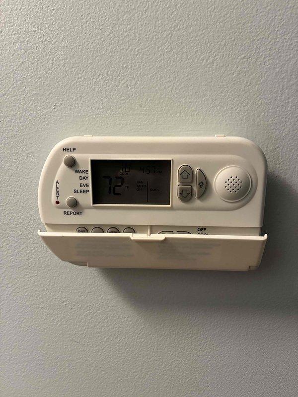 Conducted evening estimate for generator installation at residential property. Assessed utility room electrical infrastructure and existing thermostat system to determine compatibility and installation requirements for backup power system. Documented current HVAC controls and utility room configuration with photographs for proposal development.