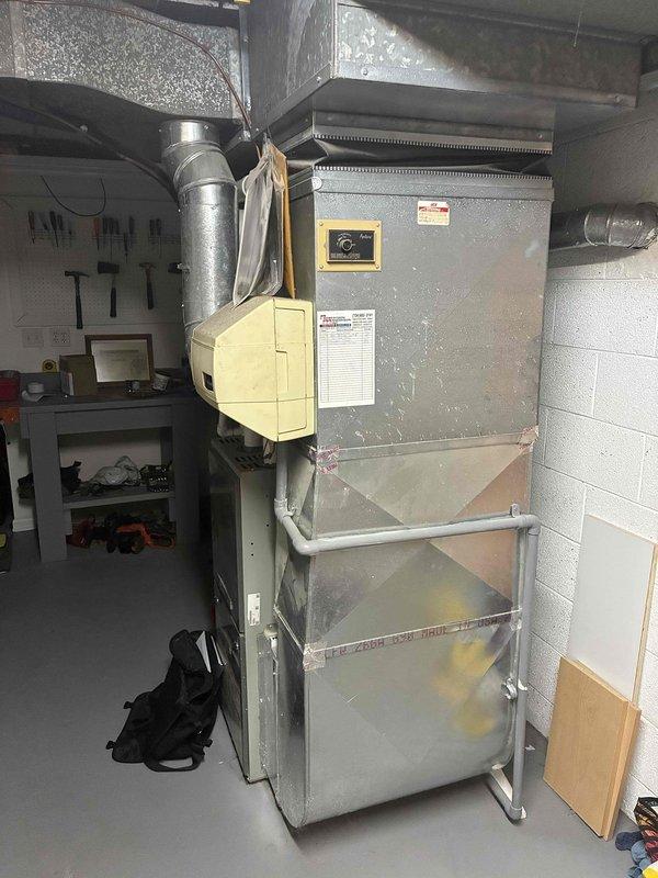 Performed comprehensive HVAC system evaluation on residential split system consisting of Trane outdoor condensing unit and indoor gas furnace. Diagnosed failed heat exchanger in furnace unit, confirmed by visual inspection showing deterioration and safety concerns requiring immediate replacement recommendation. Conducted refrigerant analysis on R22 air conditioning system, identifying undercharged condition with all capacitor readings measuring out of acceptable range, indicating electrical component degradation. Documented equipment conditions through photography for estimate preparation. Provided single component replacement estimate options to address critical heat exchanger failure and discussed full system replacement considerations given age of equipment, obsolete R22 refrigerant, and multiple component deficiencies affecting system reliability and efficiency.