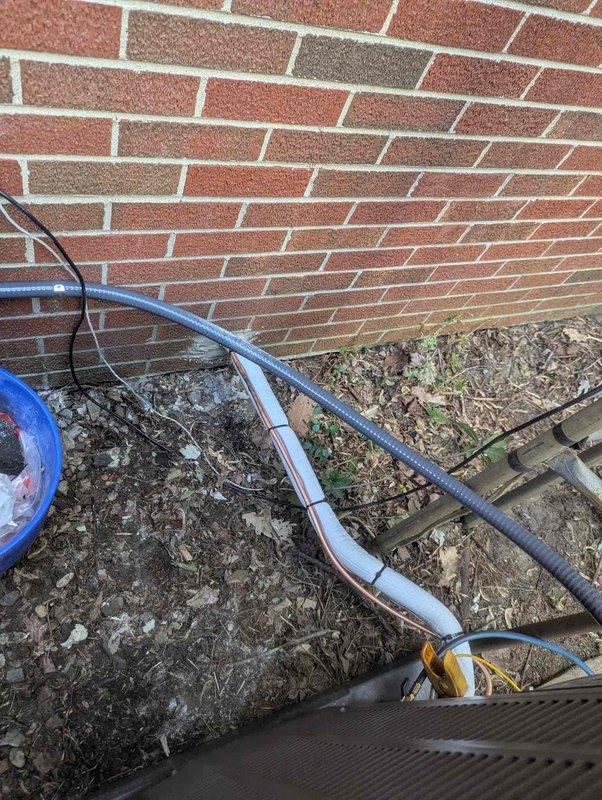 Completed installation of 3-ton air conditioning system with matching evaporator coil at rear location of property. Installed new refrigerant line set with proper insulation, ran lines along building exterior, and made all necessary electrical connections at main breaker panel. System was successfully reconnected, tested for proper operation, and left in full working condition per warranty specifications.