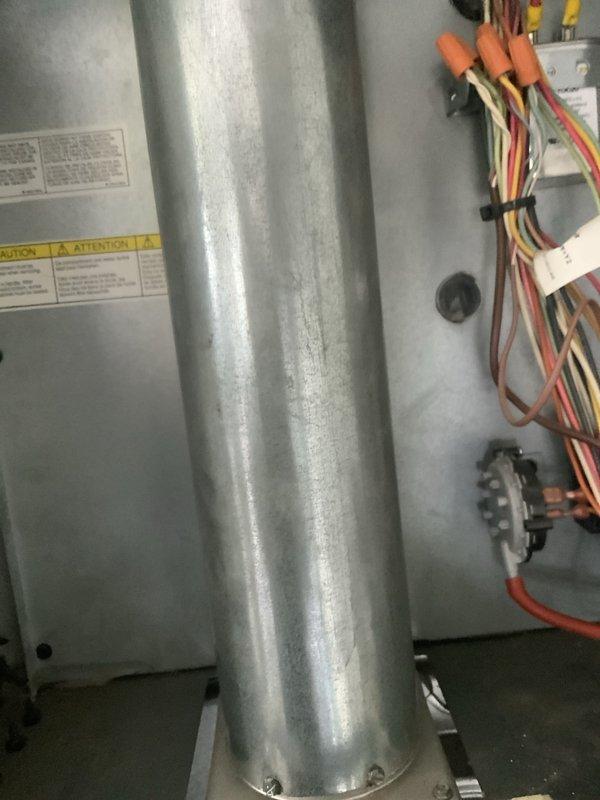 Completed annual AC tune-up maintenance on attic-mounted air handler system per prepaid membership agreement. Performed comprehensive inspection of heat exchanger, electrical connections, and refrigerant lines. Verified proper operation of condensate drain system, inspected wire terminations with orange wire nuts for secure connections, and confirmed unit functionality with all components operating within normal parameters.