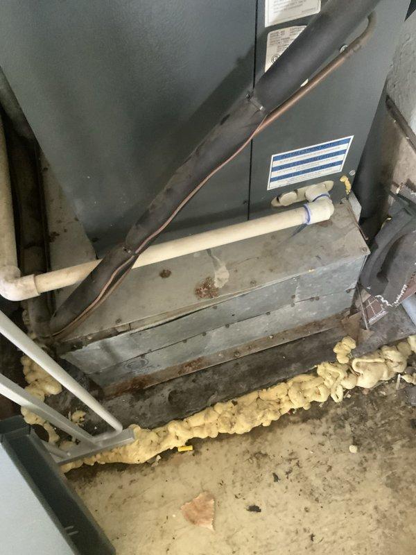 Completed annual AC tune-up maintenance on attic-mounted air handler system per prepaid membership agreement. Performed comprehensive inspection of heat exchanger, electrical connections, and refrigerant lines. Verified proper operation of condensate drain system, inspected wire terminations with orange wire nuts for secure connections, and confirmed unit functionality with all components operating within normal parameters.