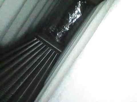 Completed routine CLUB AC 10-2 maintenance agreement visit, performing ten-point air conditioning inspection and two-point safety inspection. Documented significant mold growth and staining around return air grille, indicating potential moisture intrusion or condensation issues requiring attention, and inspected exterior corrugated metal roofing panels near HVAC equipment location.