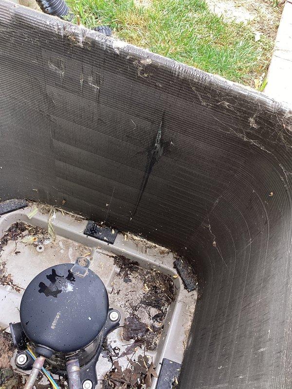 Responded to no cooling complaint on Bryant air conditioning system. Upon arrival, found condenser unit operational but outdoor coil heavily contaminated with dirt and debris buildup restricting airflow. Customer had previously replaced capacitor without resolution. Performed thorough inspection of condenser unit and verified electrical components functioning properly. Cleaned condenser coil to restore proper heat transfer and airflow. System tested and confirmed cooling restored to normal operation throughout home.