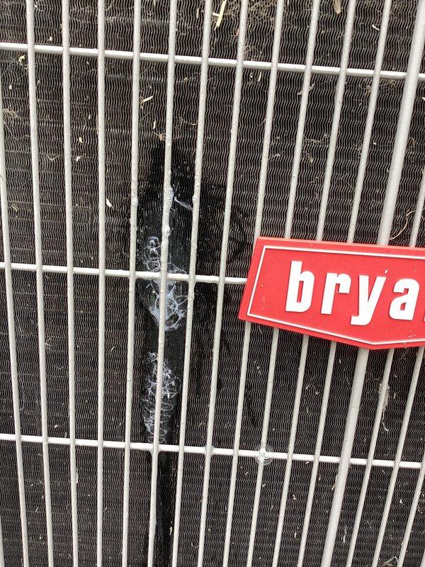 Responded to no cooling complaint on Bryant air conditioning system. Upon arrival, found condenser unit operational but outdoor coil heavily contaminated with dirt and debris buildup restricting airflow. Customer had previously replaced capacitor without resolution. Performed thorough inspection of condenser unit and verified electrical components functioning properly. Cleaned condenser coil to restore proper heat transfer and airflow. System tested and confirmed cooling restored to normal operation throughout home.