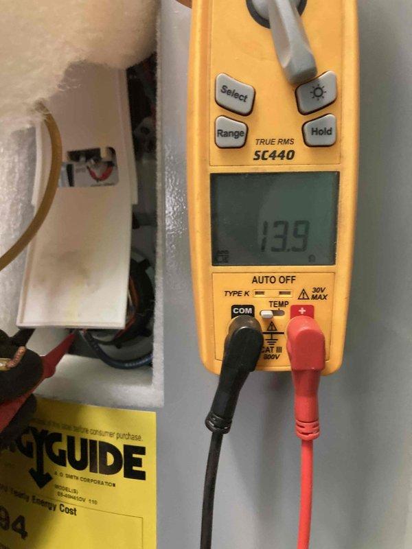 Responded to no hot water complaint on tanked water heater. Upon inspection, found failed lower heating element with heavy mineral buildup and corrosion. Removed defective heating element, verified electrical continuity with multimeter showing open circuit at 139 ohms, confirming element failure. Replaced heating element with new unit including gasket, restored power, and tested system for proper operation.