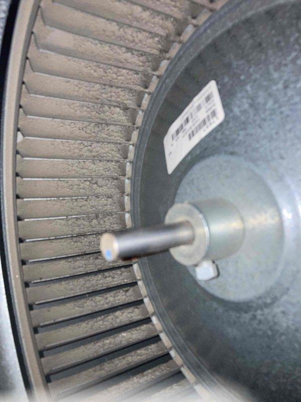 Completed preventative maintenance inspection on air conditioning system under Club AC8-12 agreement. Inspected blower wheel assembly and found moderate dust accumulation on blades and surfaces; documented condition with photos showing operational wear consistent with normal use. Examined condensate drain assembly, trap mechanism, and associated electrical wiring connections within air handler cabinet; all components functioning properly with no immediate service requirements identified.