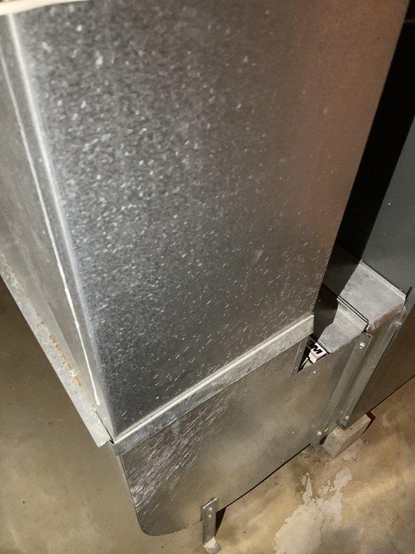 Conducted estimate for air conditioning system replacement. Evaluated existing R-22 system and determined unit was low on refrigerant with additional mechanical issues requiring extensive repairs. Assessed that repair costs would exceed value of aging equipment, making replacement the more economical solution. Documented current furnace and air handler configuration in basement mechanical room. Provided recommendations for new AC system installation to replace obsolete R-22 unit.