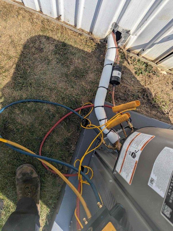 Completed installation of new air conditioning system and evaporator coil. Connected outdoor condenser unit with proper refrigerant lines, installed indoor coil assembly in air handler, verified all electrical connections, charged system with refrigerant to manufacturer specifications, and tested operation to ensure proper cooling performance.