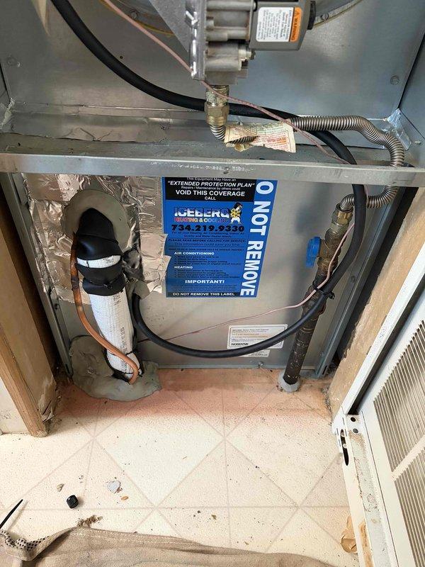 Completed installation of new air conditioning system and evaporator coil. Connected outdoor condenser unit with proper refrigerant lines, installed indoor coil assembly in air handler, verified all electrical connections, charged system with refrigerant to manufacturer specifications, and tested operation to ensure proper cooling performance.