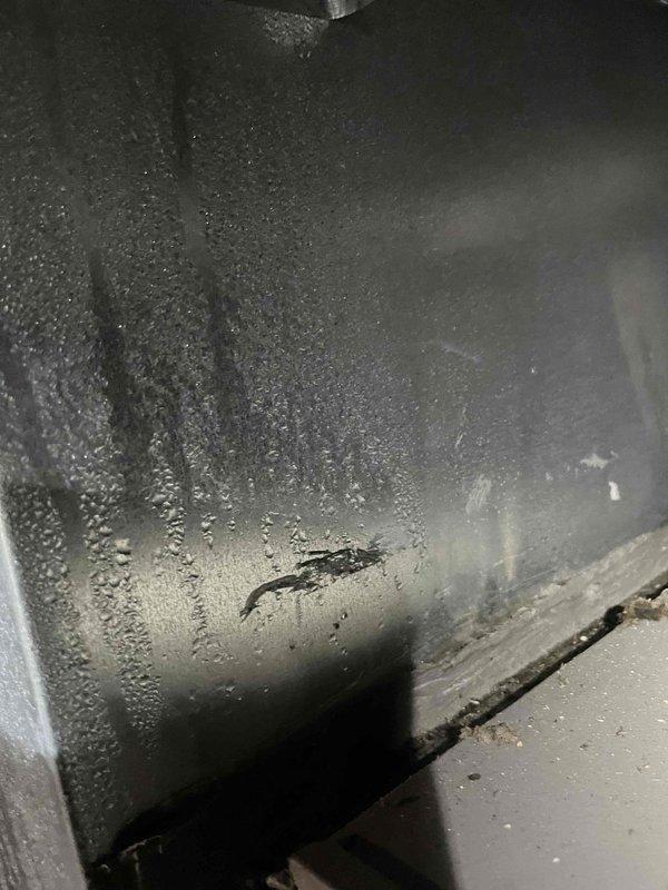 Responded to no heat call with reported odor from furnace upon operation. Upon inspection, discovered significant moisture intrusion and water damage in mechanical room affecting HVAC system. Found extensive condensation buildup inside furnace cabinet, indicating potential heat exchanger issues, improper venting, or combustion problems. Water staining on surrounding walls confirmed ongoing moisture problems in installation area. Recommended immediate system shutdown due to safety concerns related to moisture infiltration in heating components and potential carbon monoxide risk from compromised heat exchanger. Advised customer that unit requires comprehensive evaluation by qualified technician to determine source of moisture, assess heat exchanger integrity, and verify proper venting before system can be safely operated.