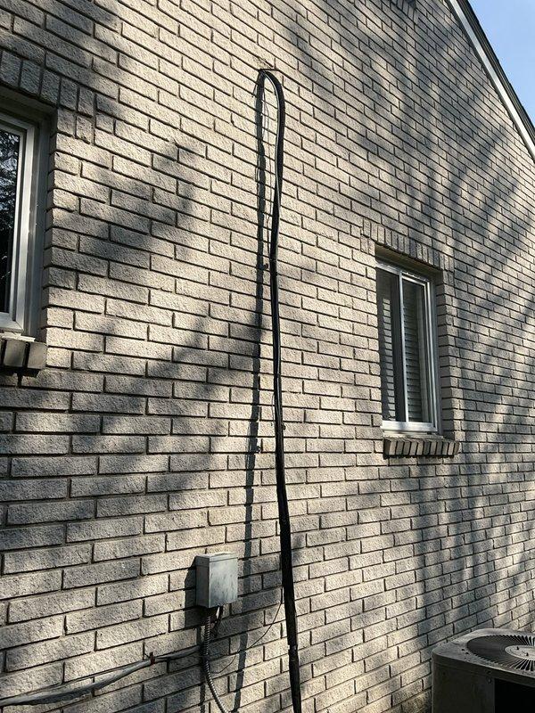 Performed on-site evaluation of residential HVAC system experiencing freezing issues. Existing unit requires R-22 refrigerant, which is being phased out and increasingly cost-prohibitive. Assessed aged outdoor condenser unit showing significant weathering, discoloration, and dirt accumulation, along with corresponding indoor air handler. Documented current system configuration including electrical disconnect, line set routing along exterior brick wall, and equipment placement. Provided comprehensive estimate for complete system replacement including new air handler and air conditioning condenser unit to resolve freezing condition and update to modern refrigerant standard.
